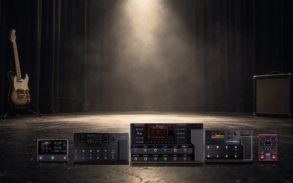 The Line 6 rigs Guitar Tone Gurus makes presets for, on a dark stage under a spotlight